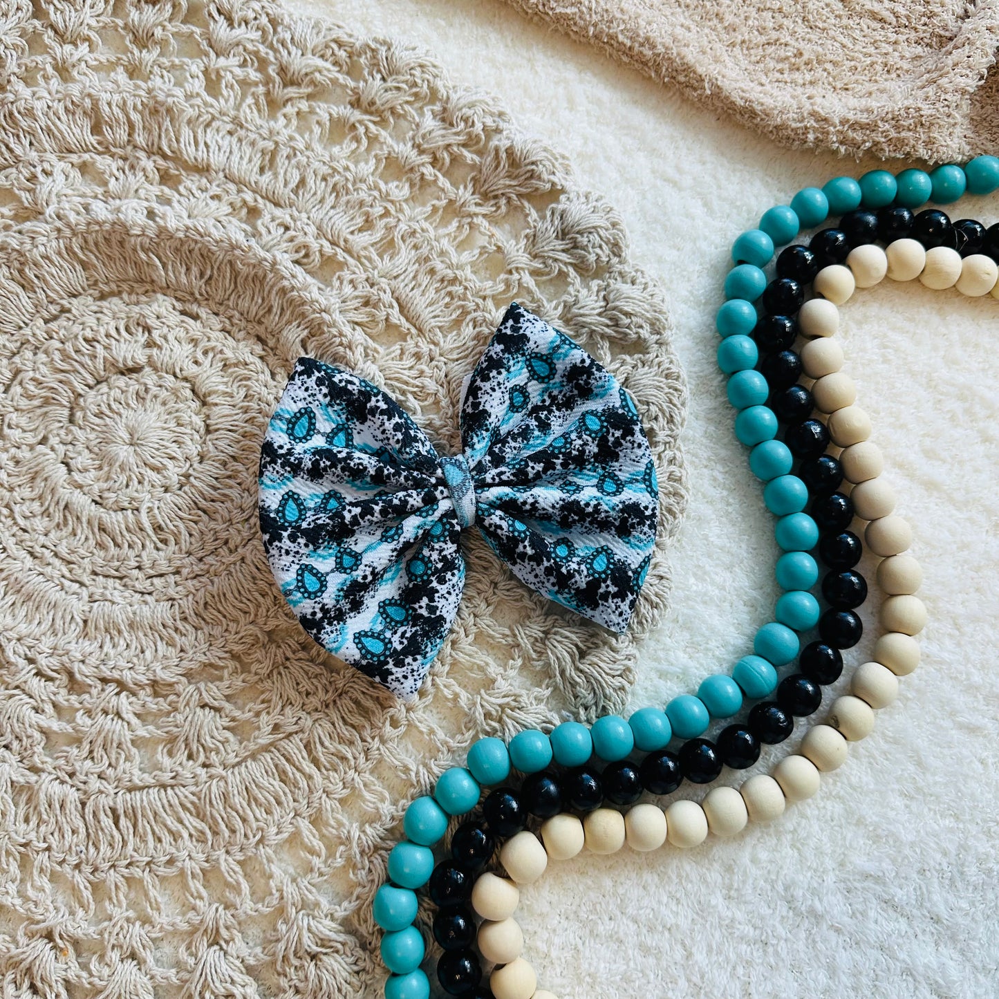Turquoise Cowprint Big Bow